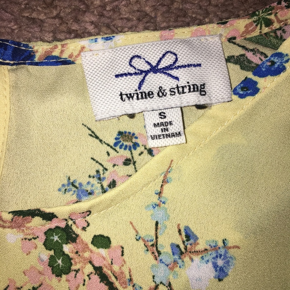 a yellow floral shirt